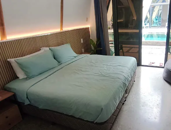 King Size Bed and Furniture in Poolside Room at Lokal Hotels Dauin