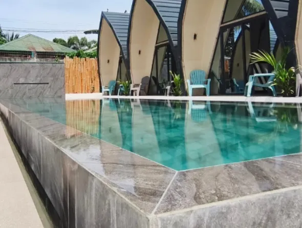 Pool and Rooms Exterior Day View at Lokal Hotels Dauin